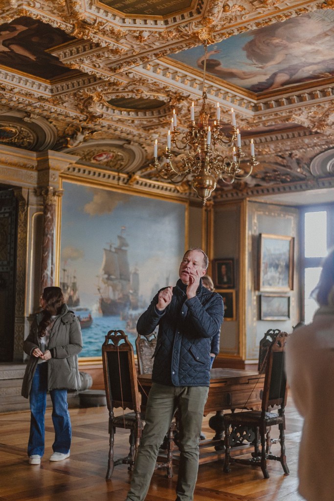 Steffen lecturing inside Frederiksberg Palace.